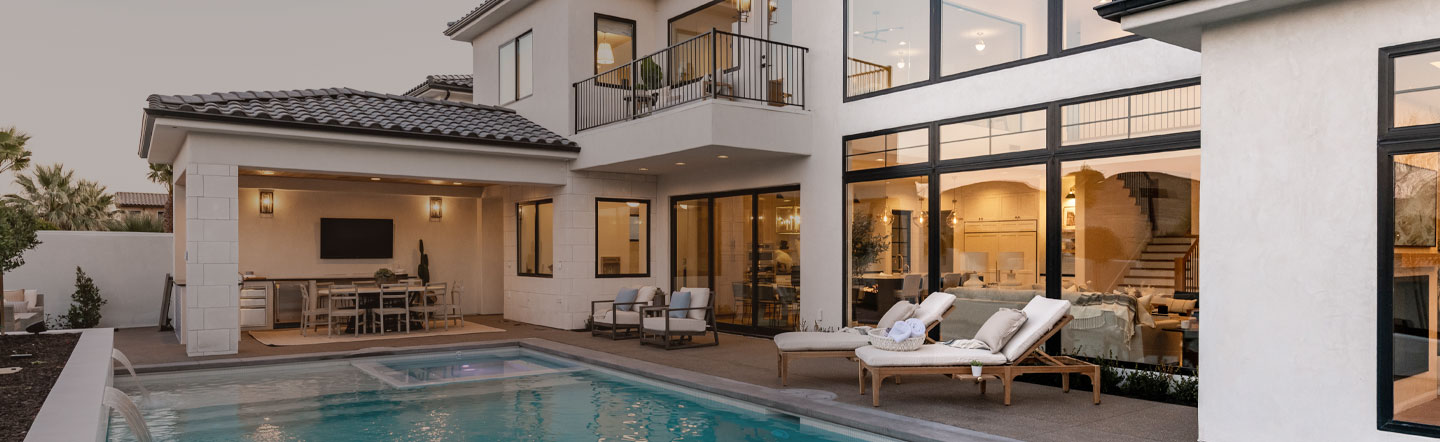 modern home with windows walls and pool